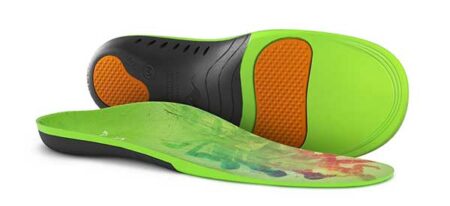 Two green shoe insoles, one showing an orange and black cushioned underside, the other displaying a colorful painted design on top.